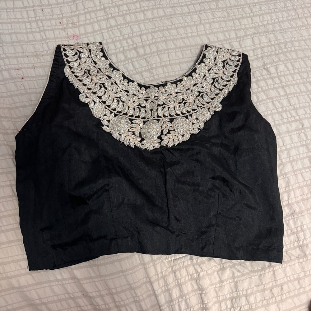 Elegant Black Sleeveless Top with Intricate Embroidery